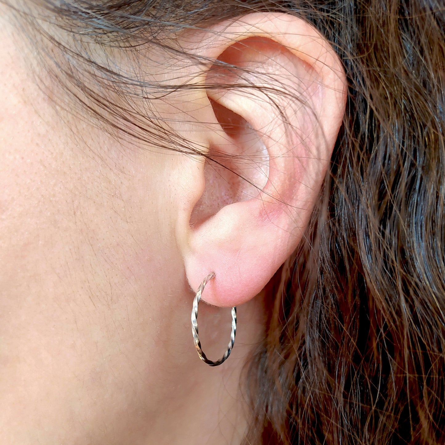 Carey | golden big twisted hoop ear studs