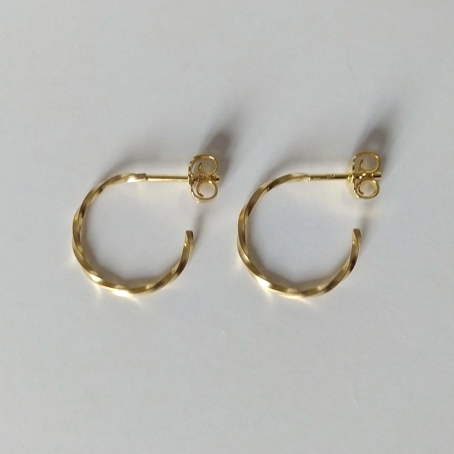 Cody | golden mini twisted hoop ear studs