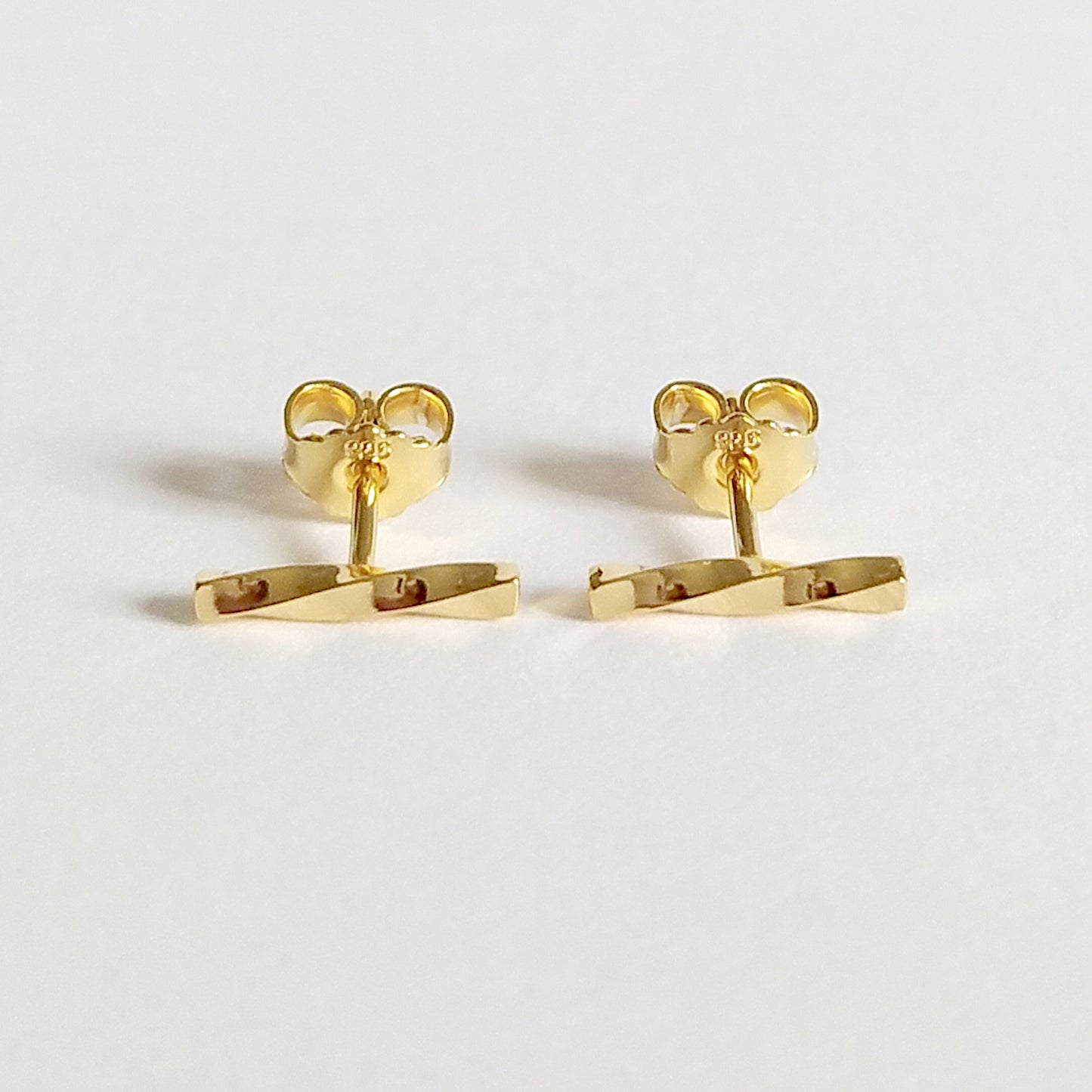 Adina | golden twisted bar stud earrings