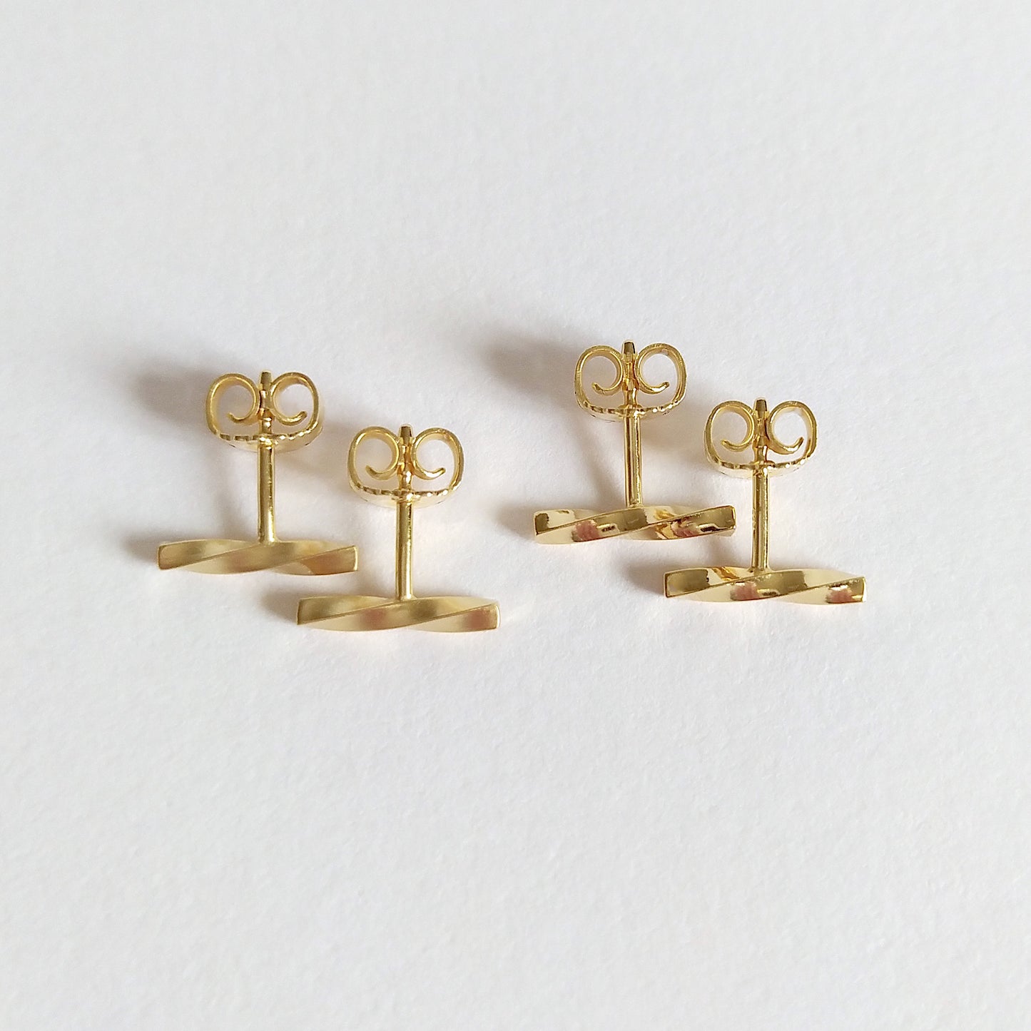 Adina | golden twisted bar stud earrings