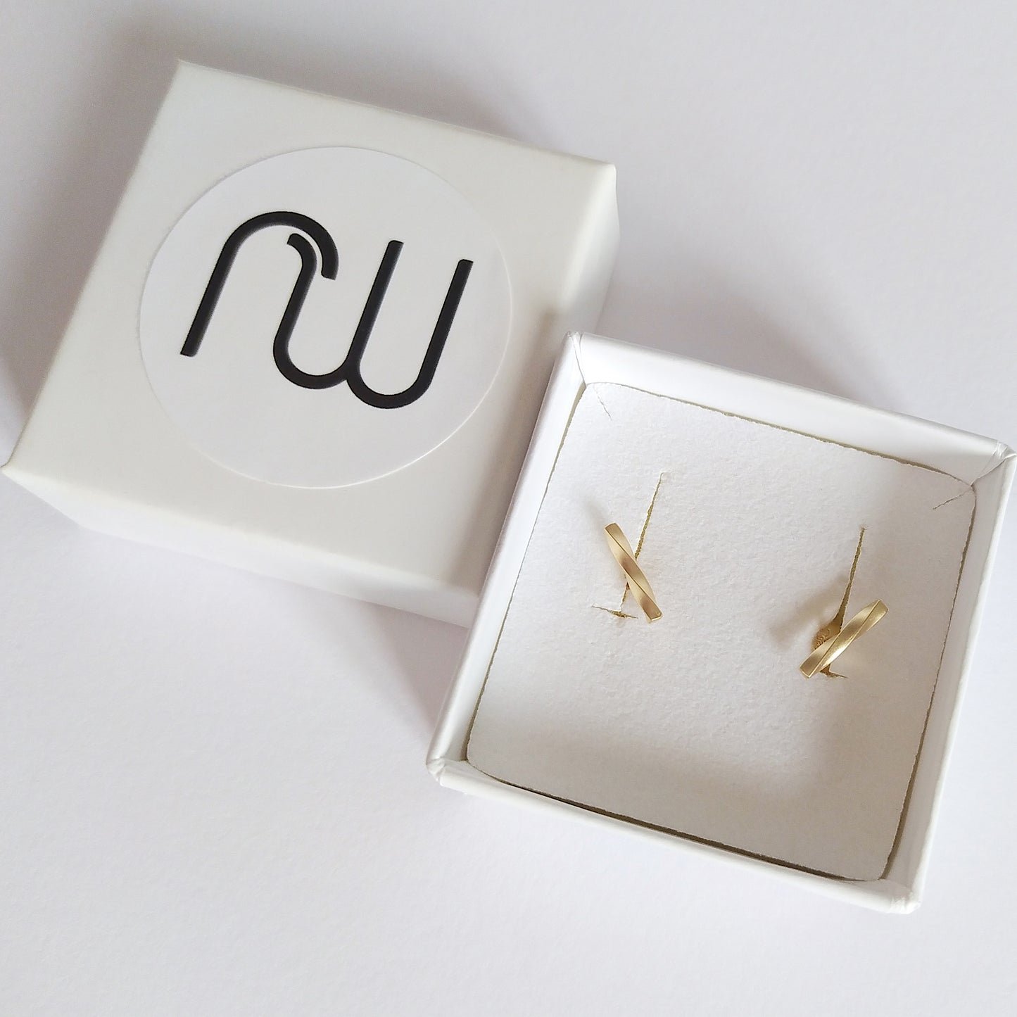 Adina | golden twisted bar stud earrings