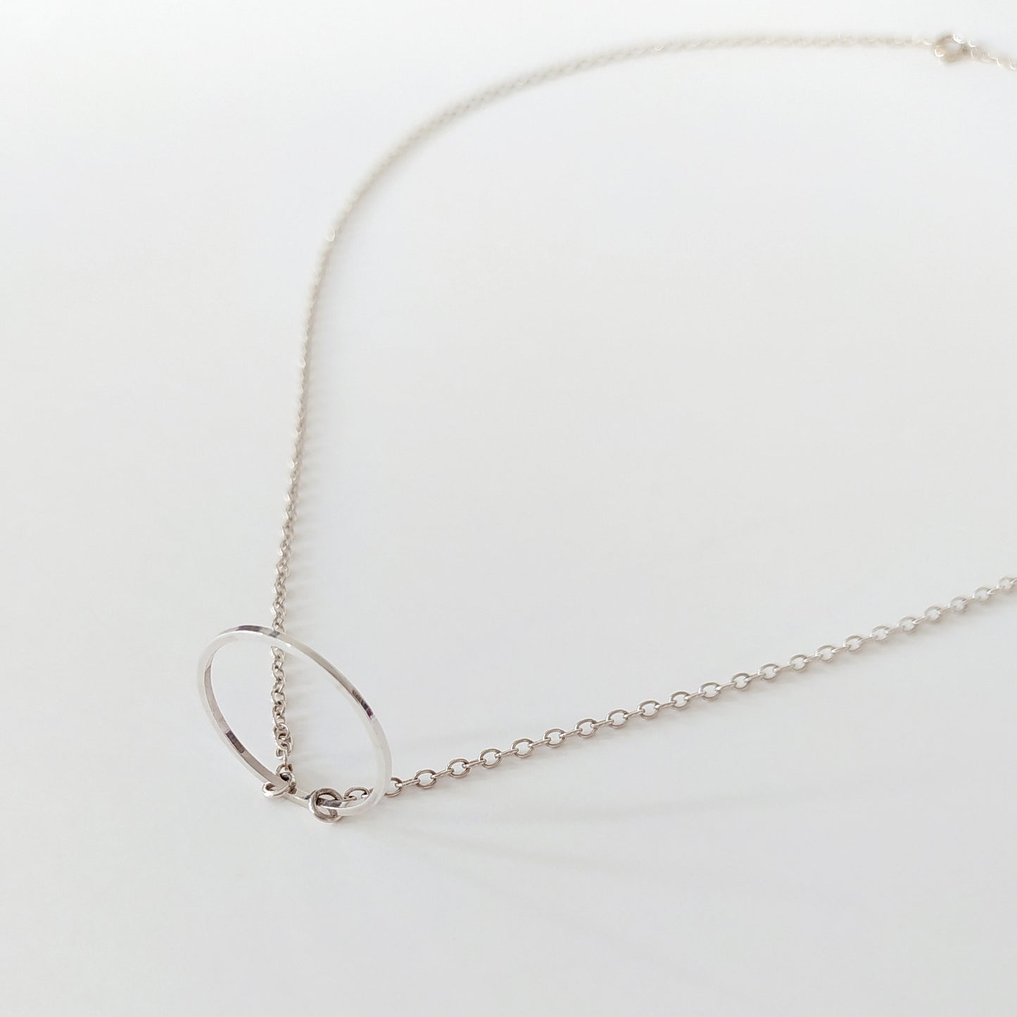 Runa | dainty silver chain with circle pendant