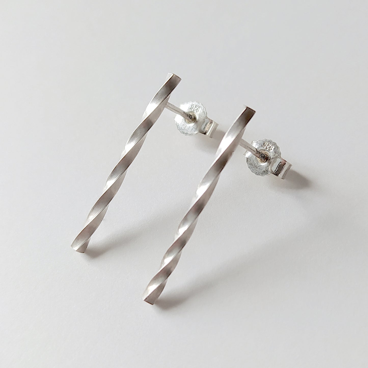 Adeja | longer twisted bar stud earrings