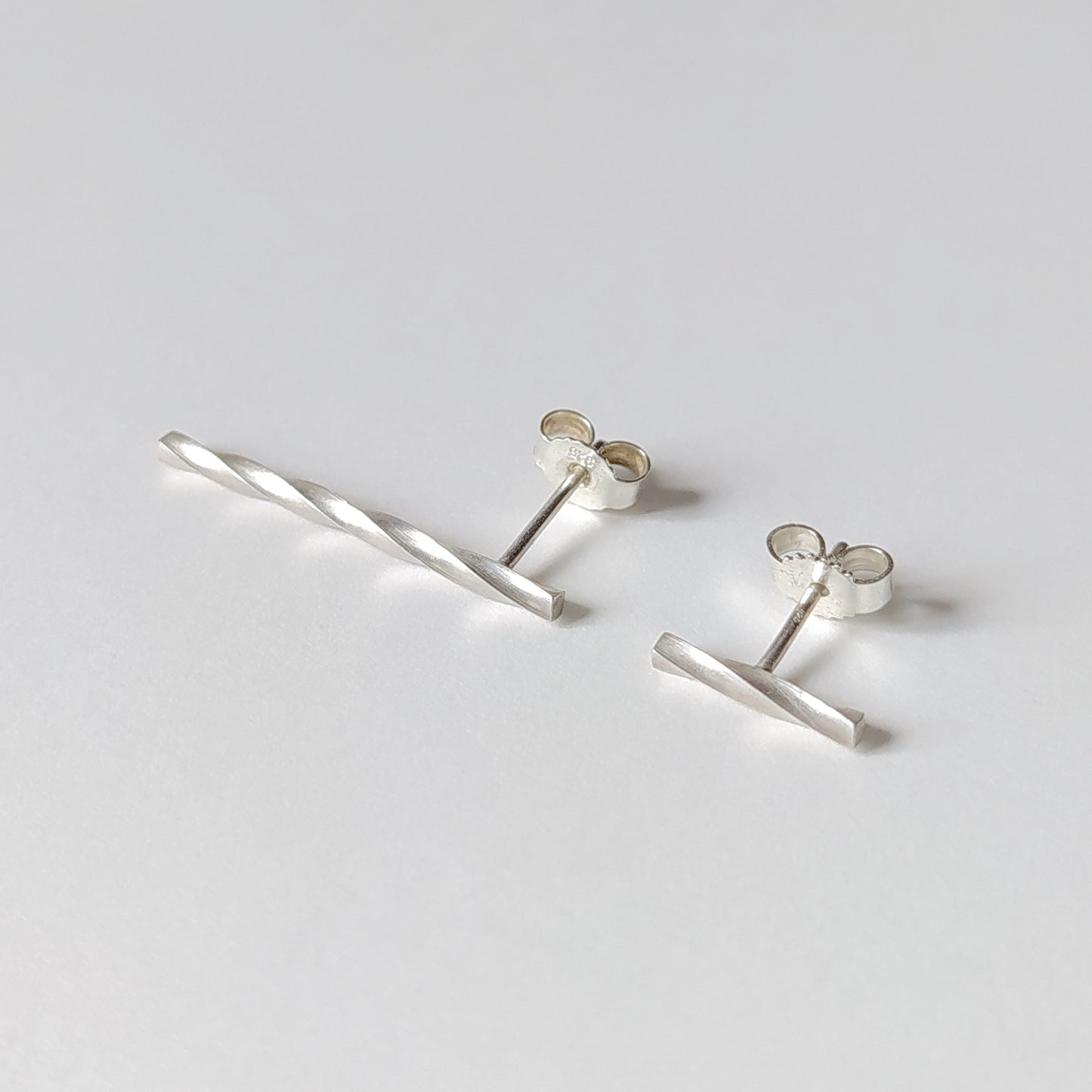 Adeja | longer twisted bar stud earrings
