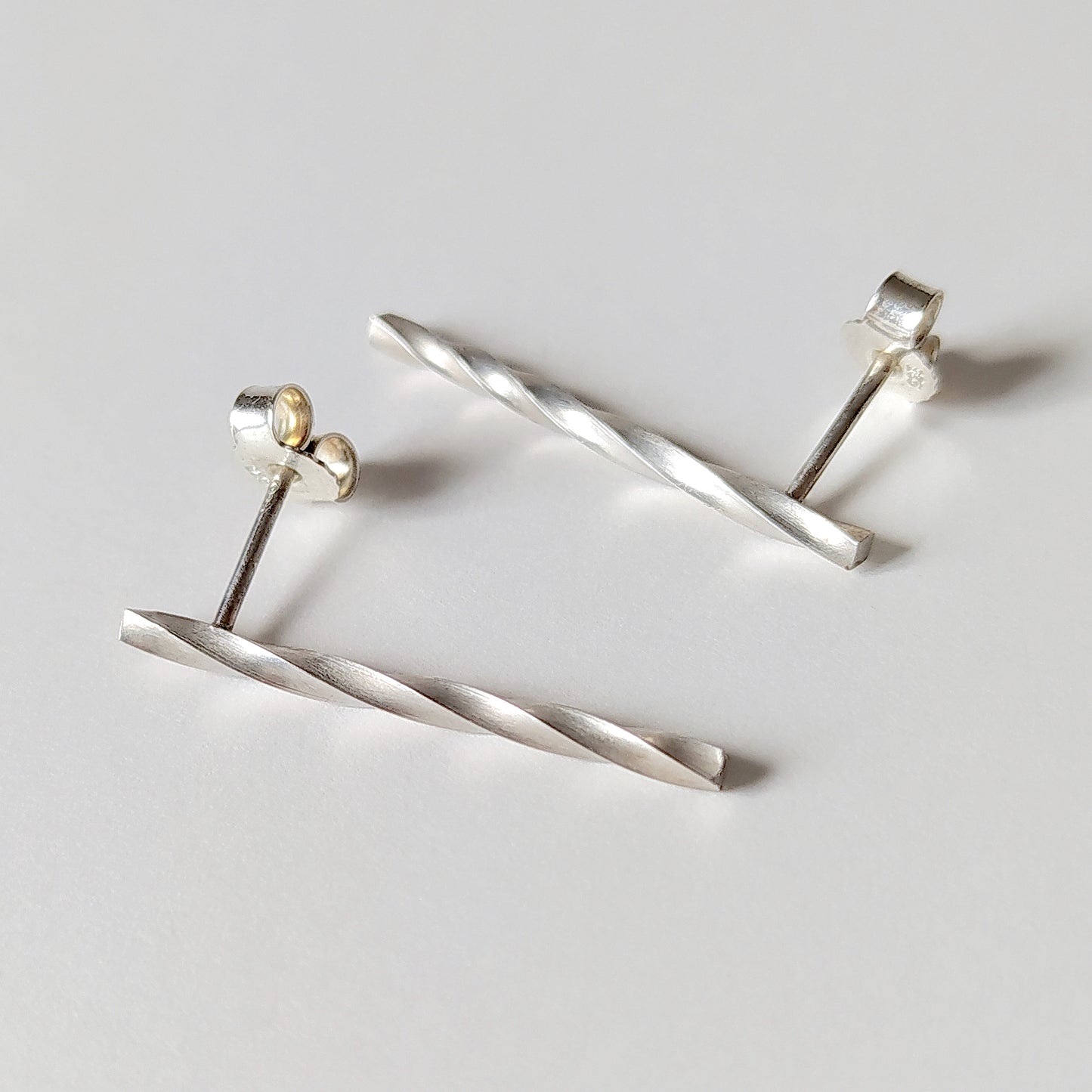 Adeja | longer twisted bar stud earrings