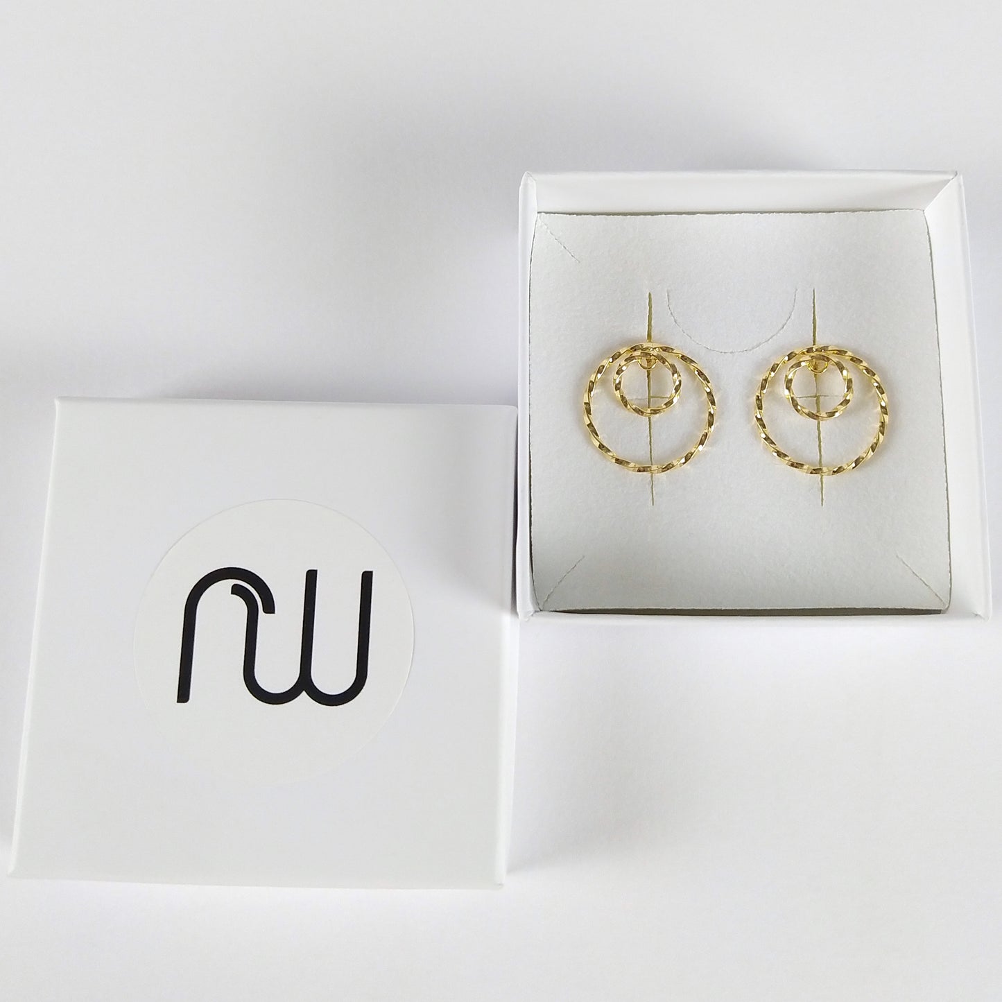 Riley | twisted golden double circle ear studs
