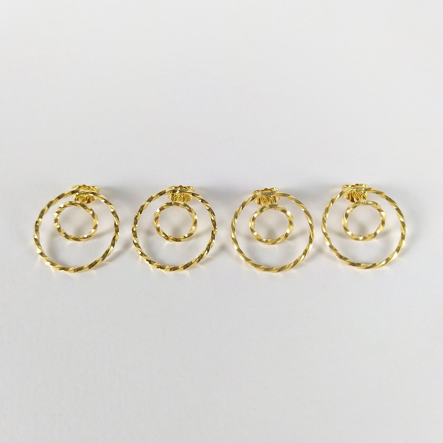 Riley | twisted golden double circle ear studs