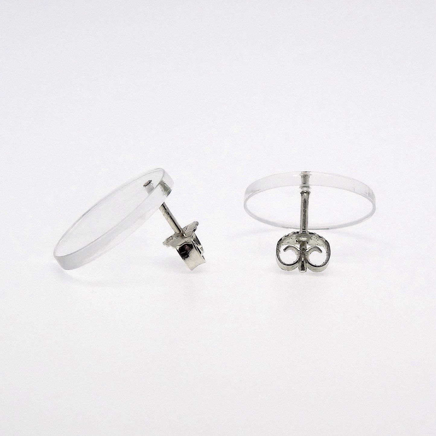 Daphne | transparent disc ear studs