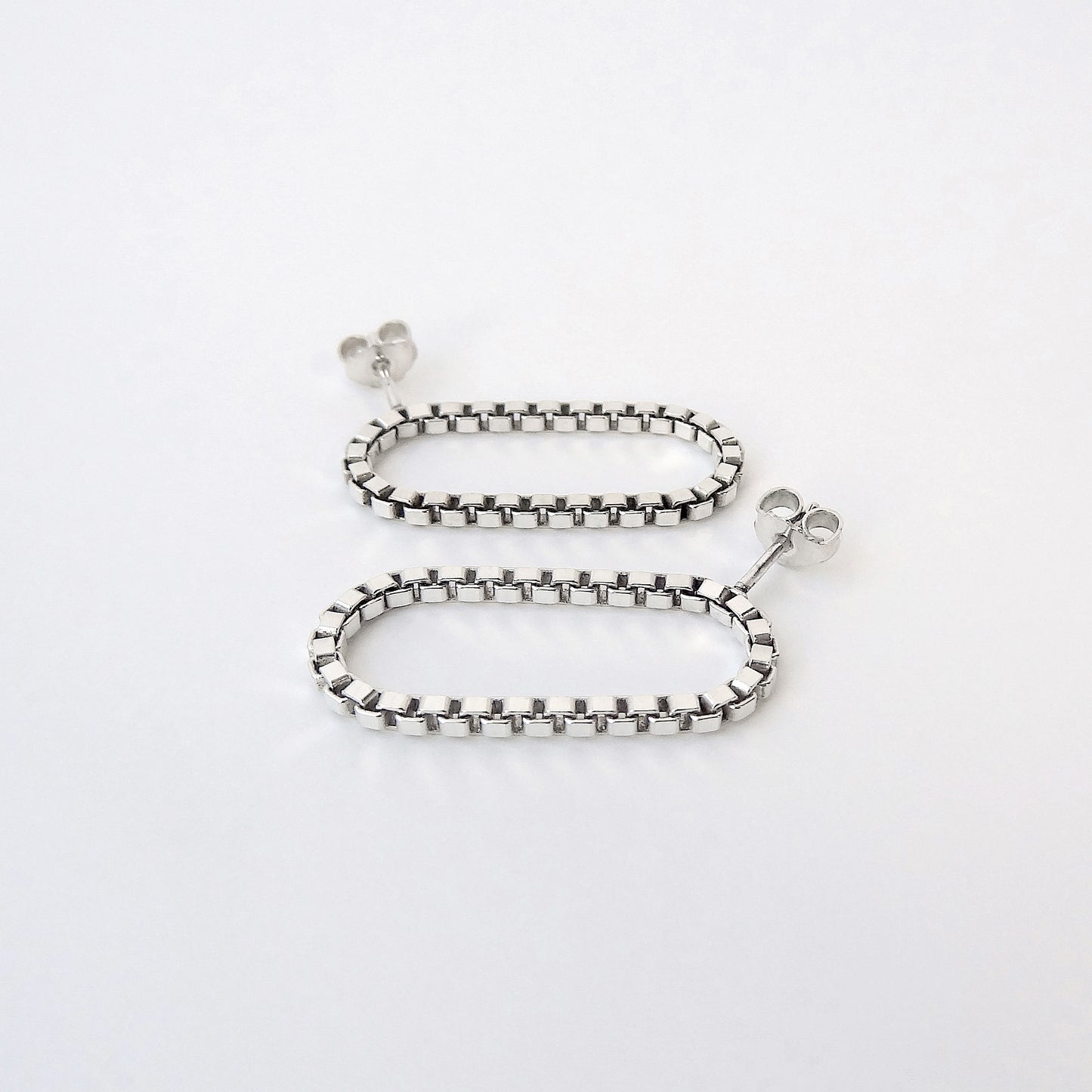 Sira | hanging oval chain earrings