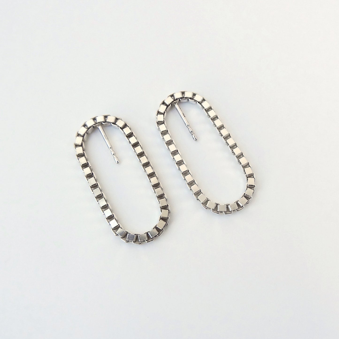 Sira | hanging oval chain earrings