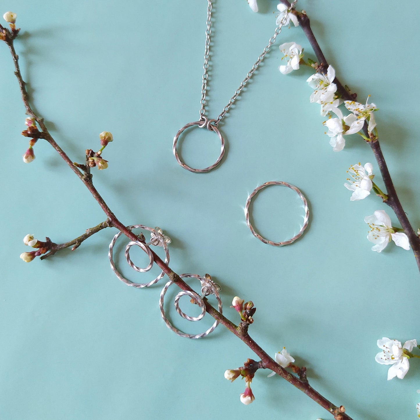 Riley | twisted golden double circle ear studs
