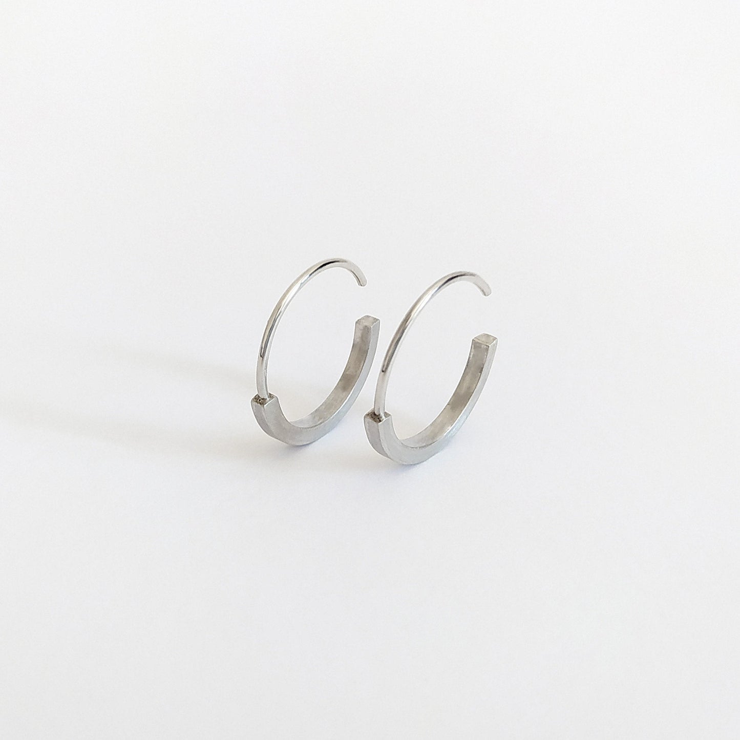 Tara | flat open hoops in silver