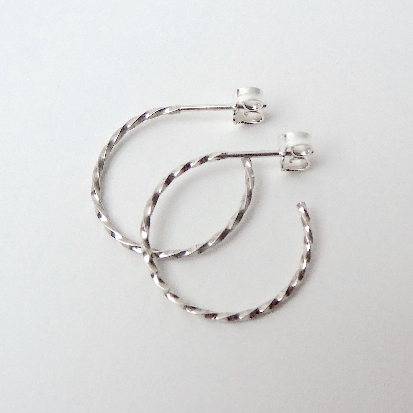 Carey | big twisted hoop ear studs