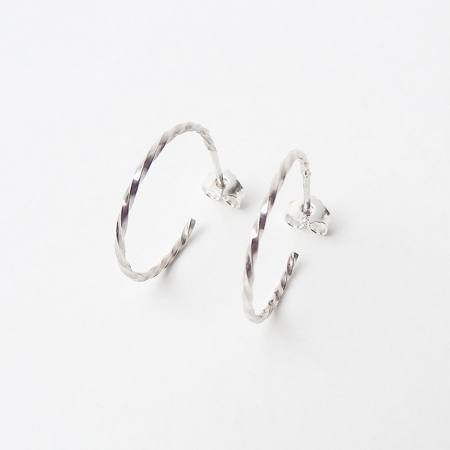Carey | big twisted hoop ear studs