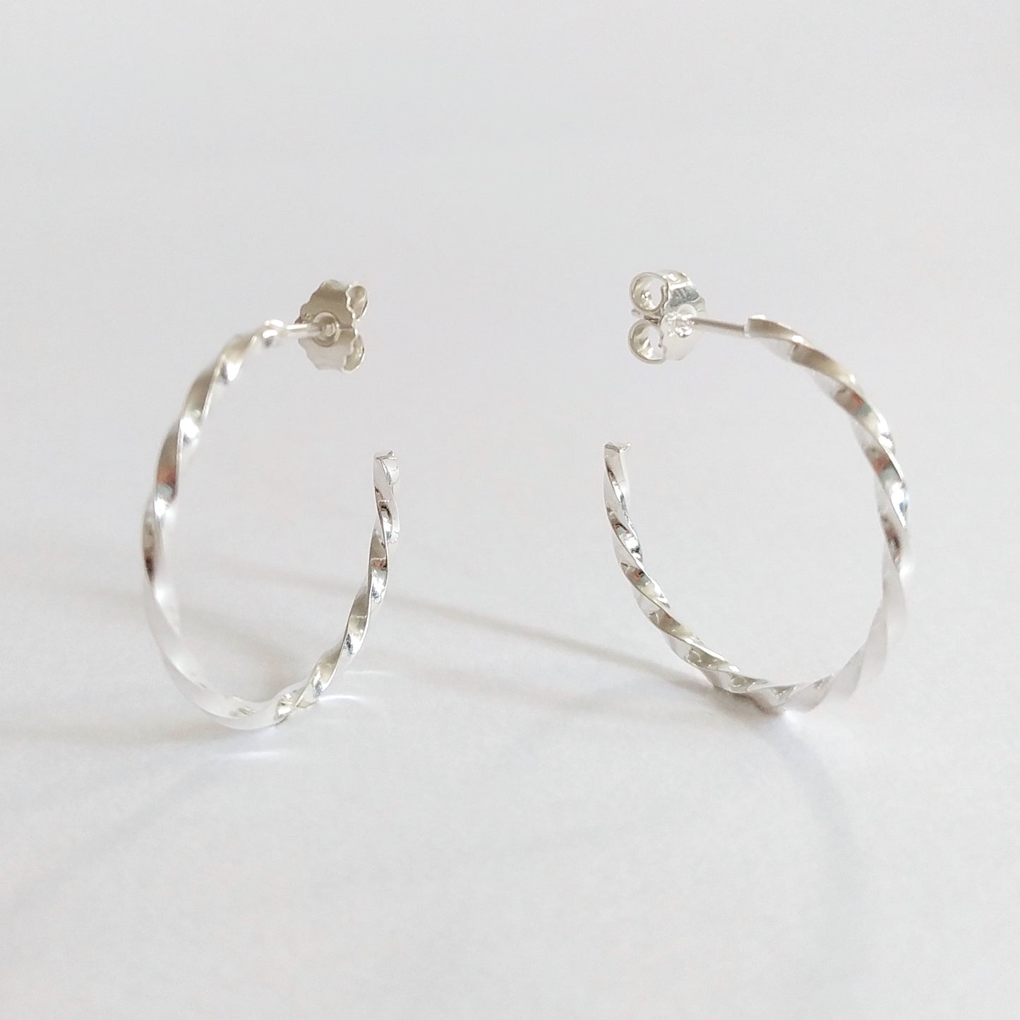 Amy | golden big twisted hoop ear studs