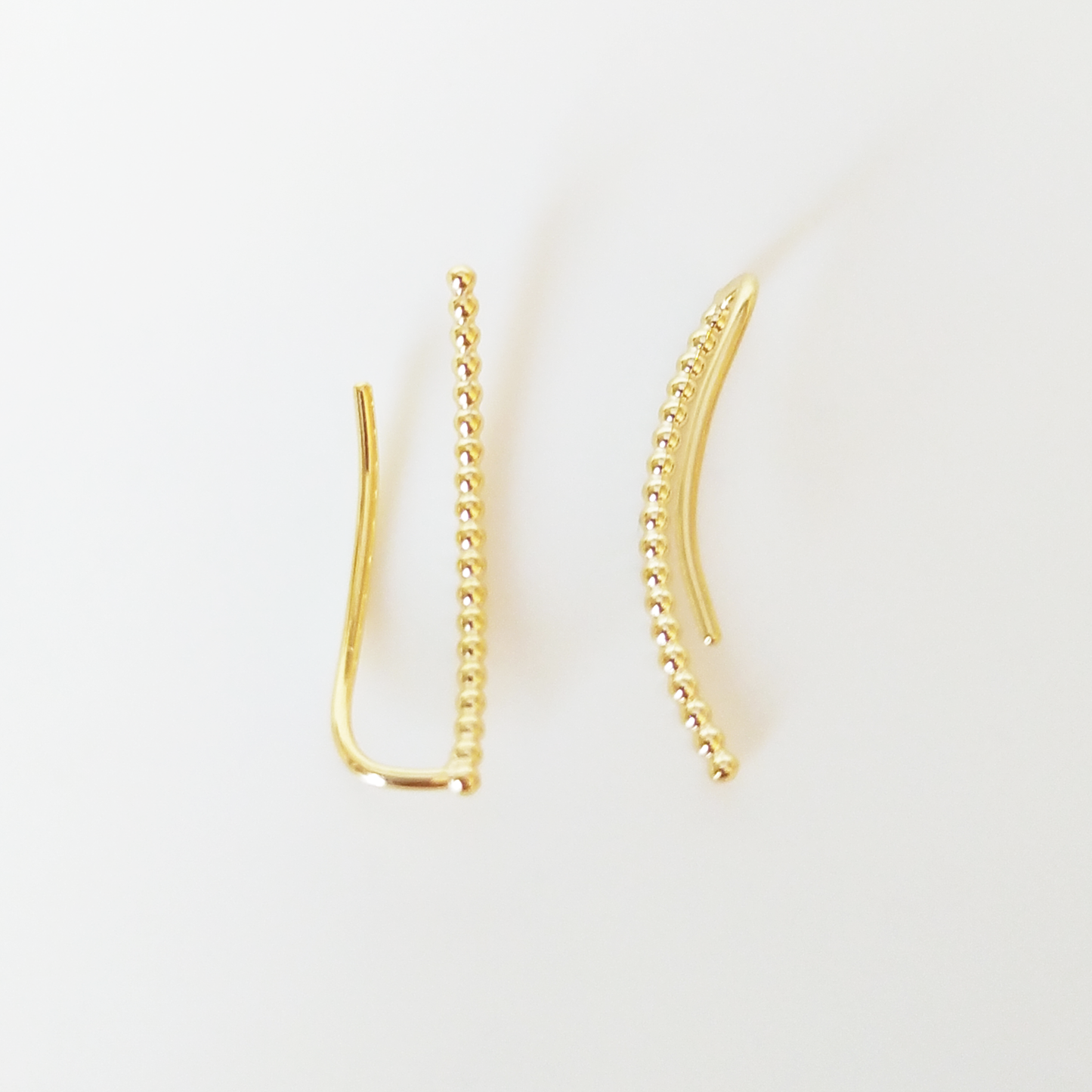 Lotti | dotted ear climber gold plated