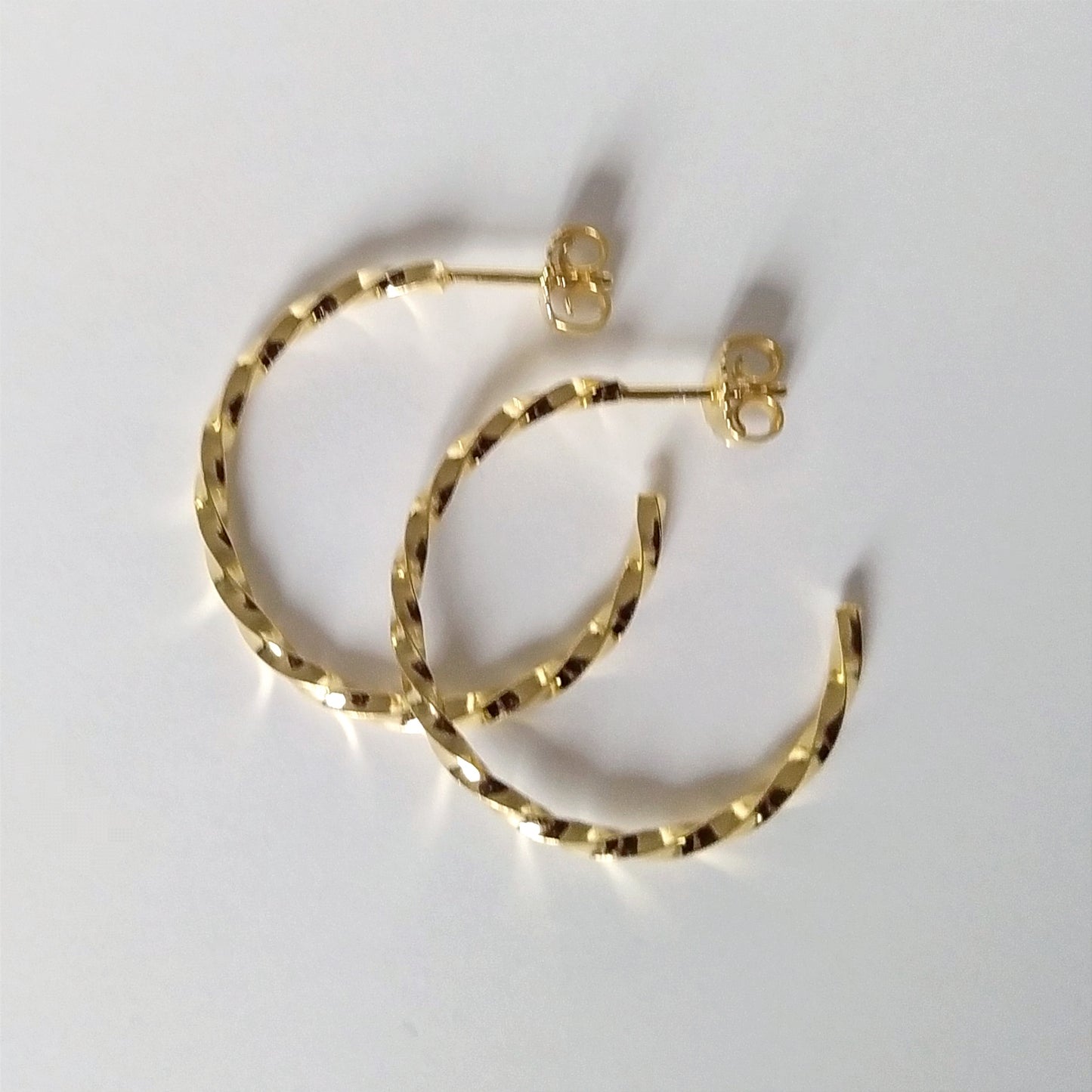 Amy | golden big twisted hoop ear studs