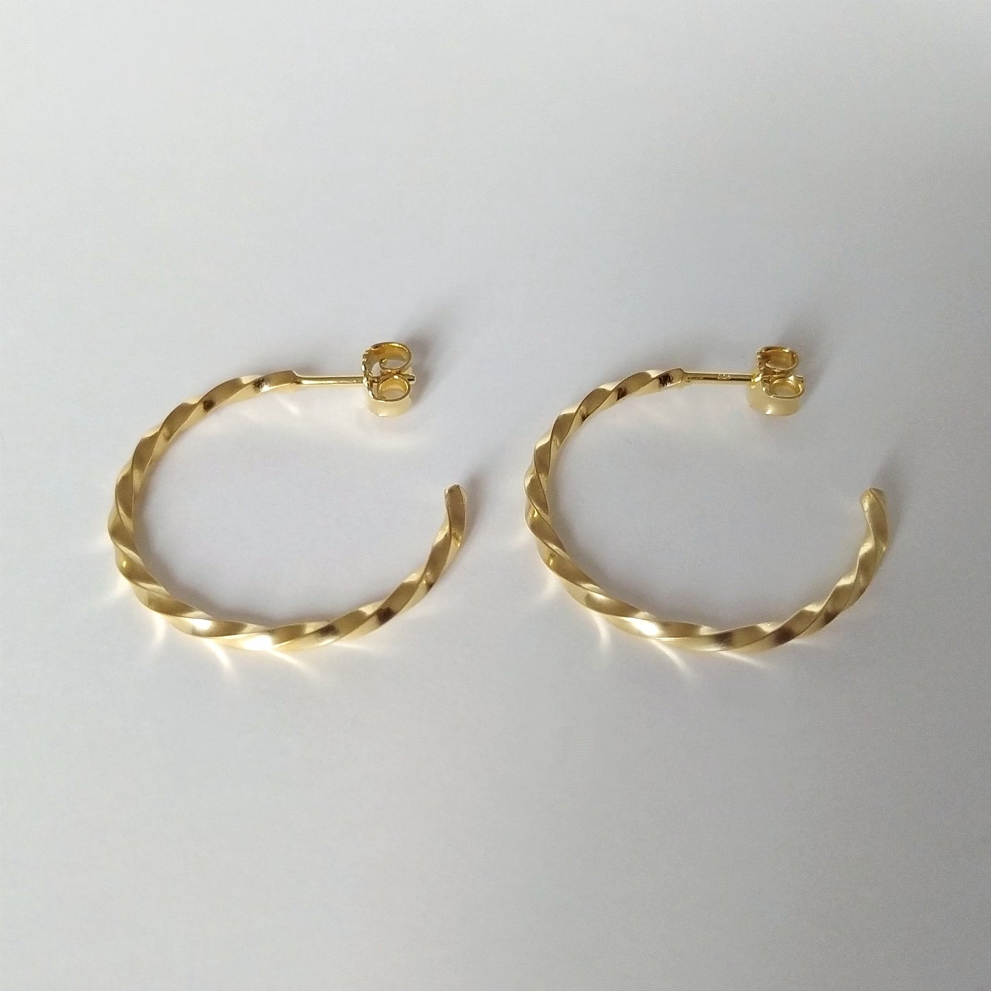 Amy | golden big twisted hoop ear studs