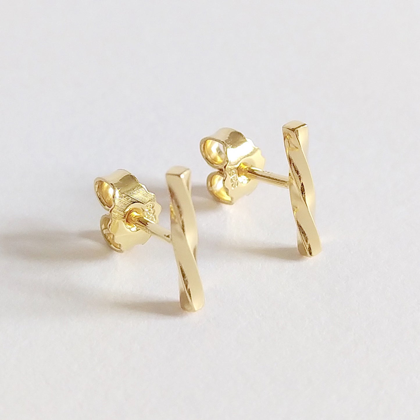 Adina | golden twisted bar stud earrings